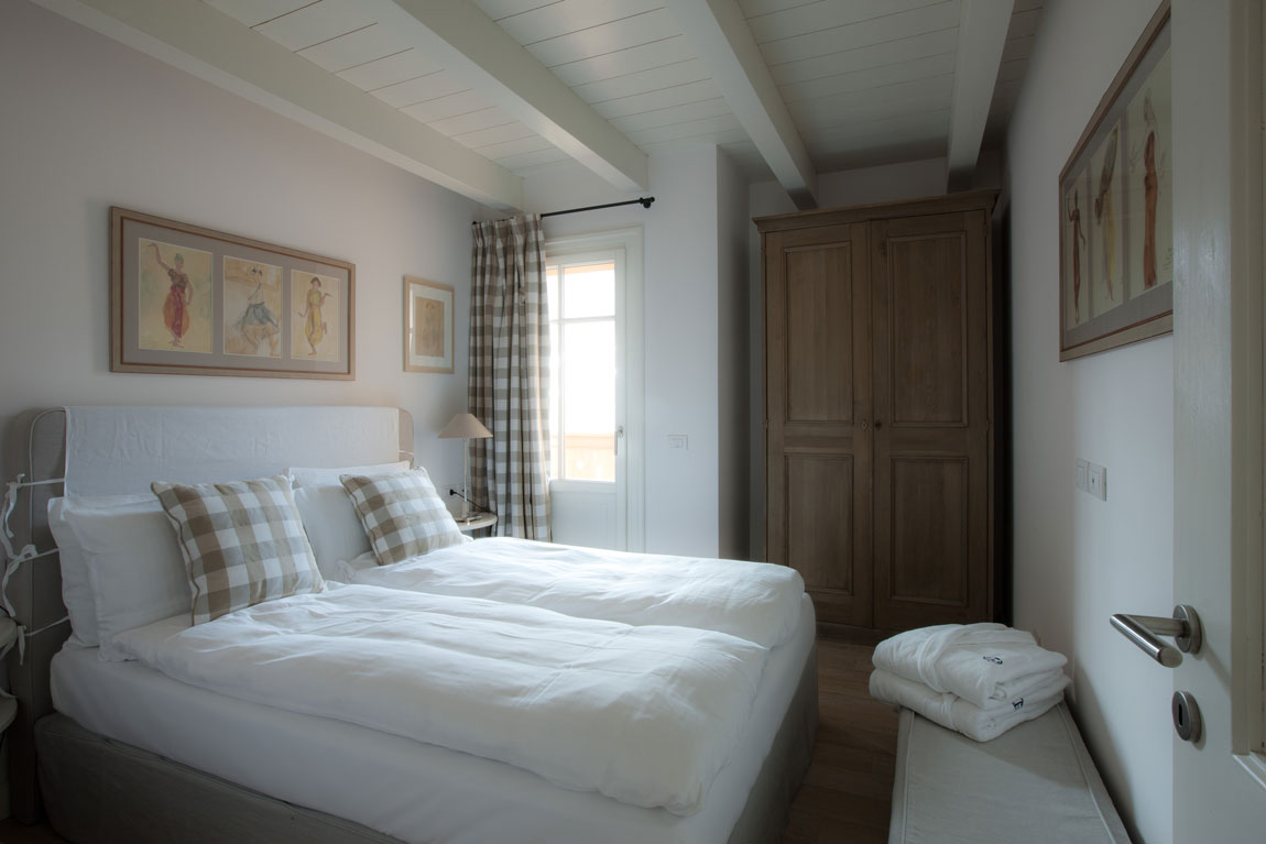 Camera da letto appartamenti trilocali in affitto a Livigno